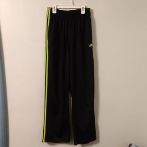 Black and neon green/yellow track pants